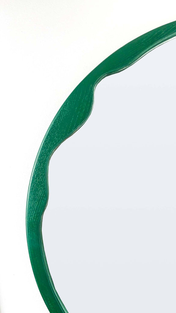 green frame mirror
